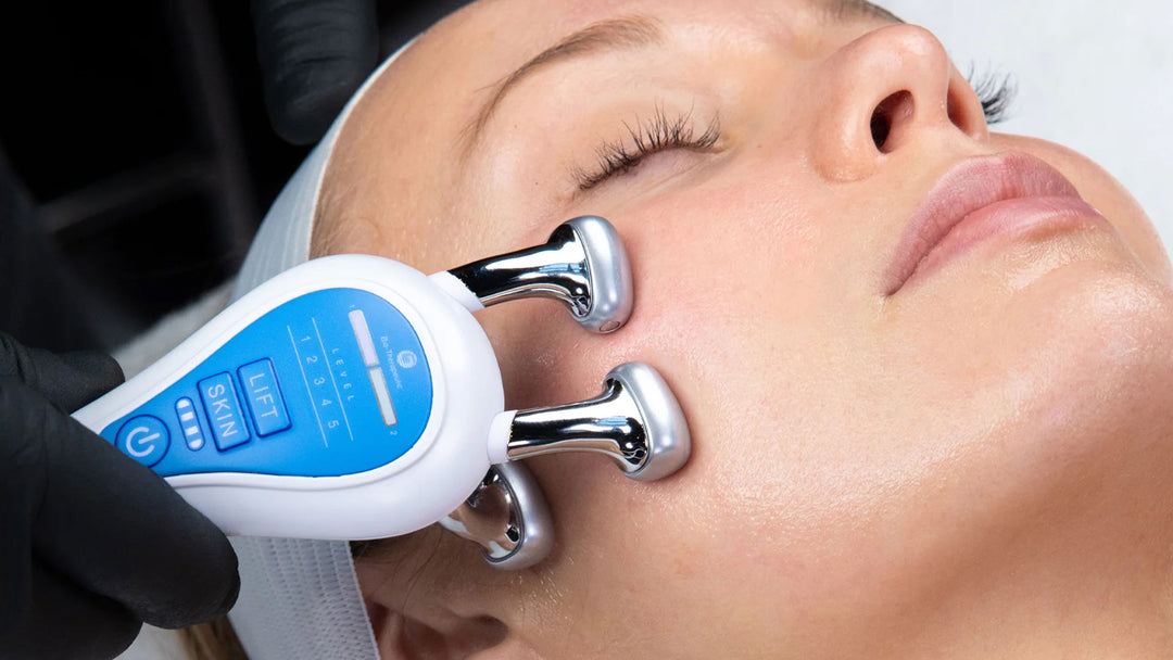 Facial rejuvenation device being used on a person's face